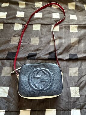Gucci Black Pebbled Leather Crossbody Bag with Red Strap and Cream Trim